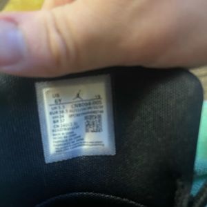 Triple black Jordan aura 2’s never worn only tried on size 6y or w7